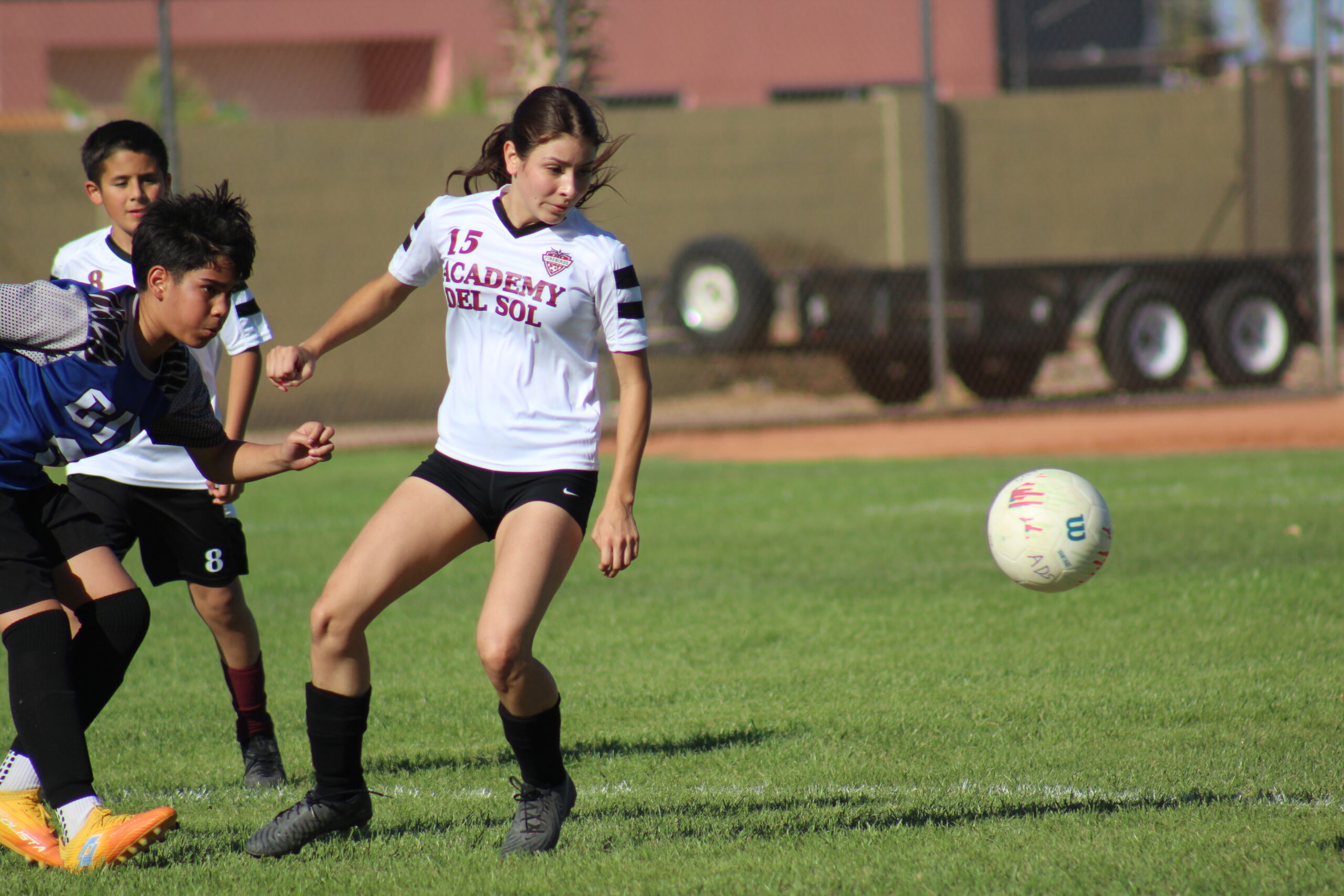 Academy Del Sol soccer team practicing fundamentals at our Tucson K-8 school