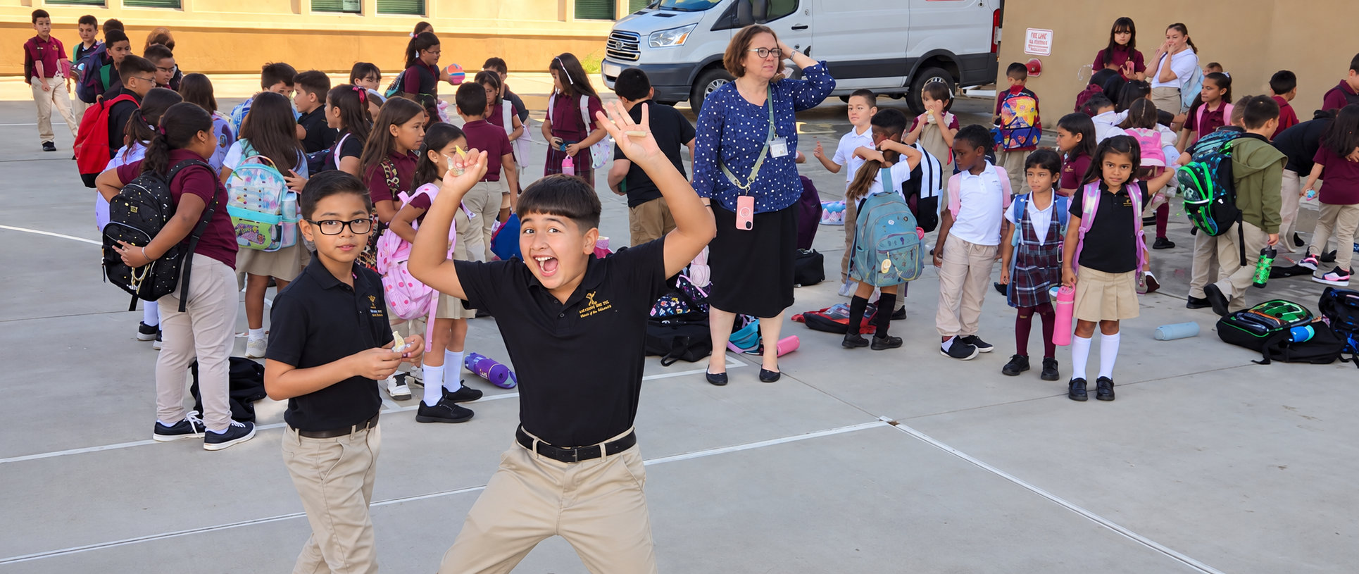 tuition-free students lined up for school